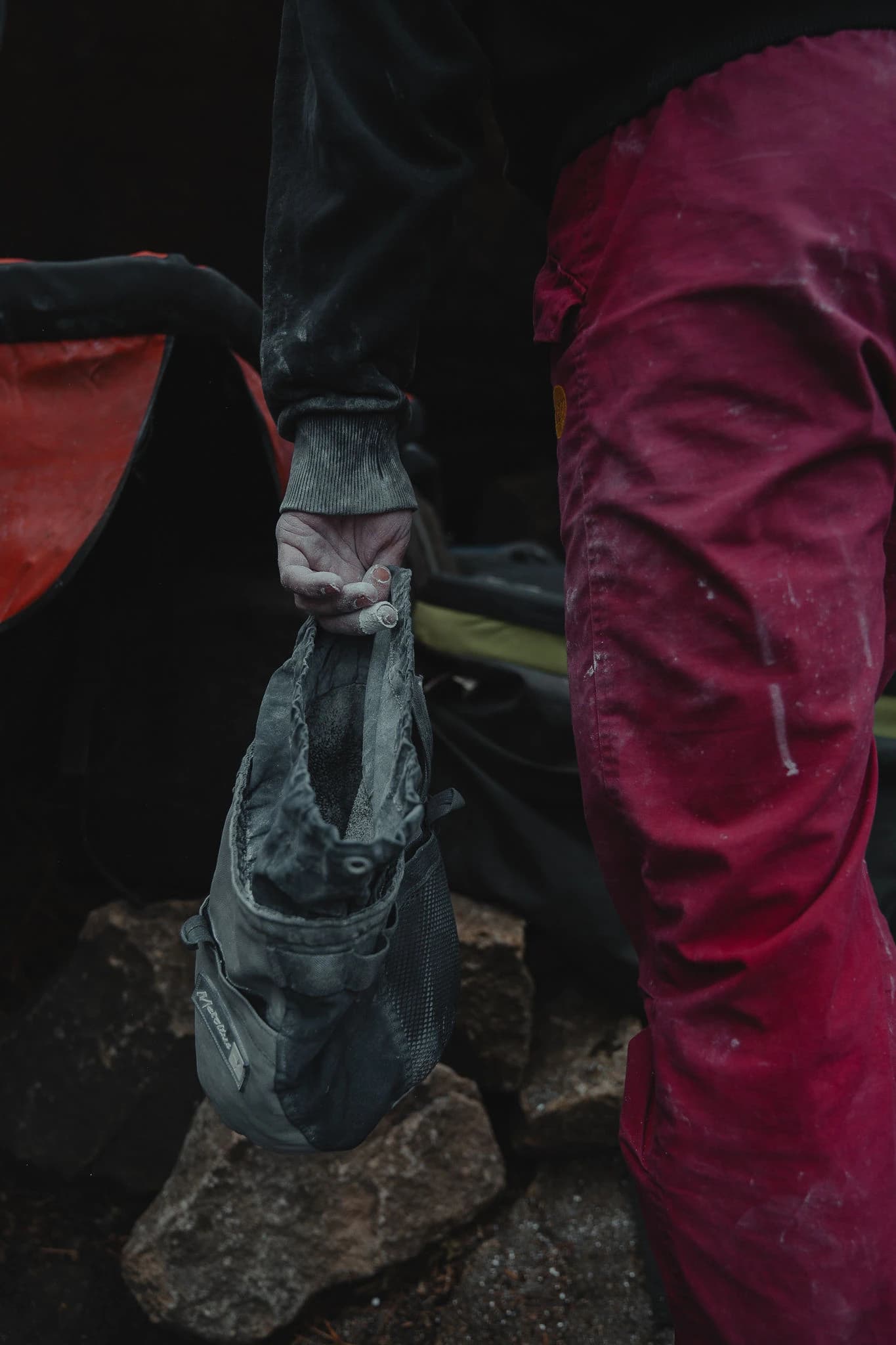 Climber on the wall with chalked hands, Peak District atmosphere